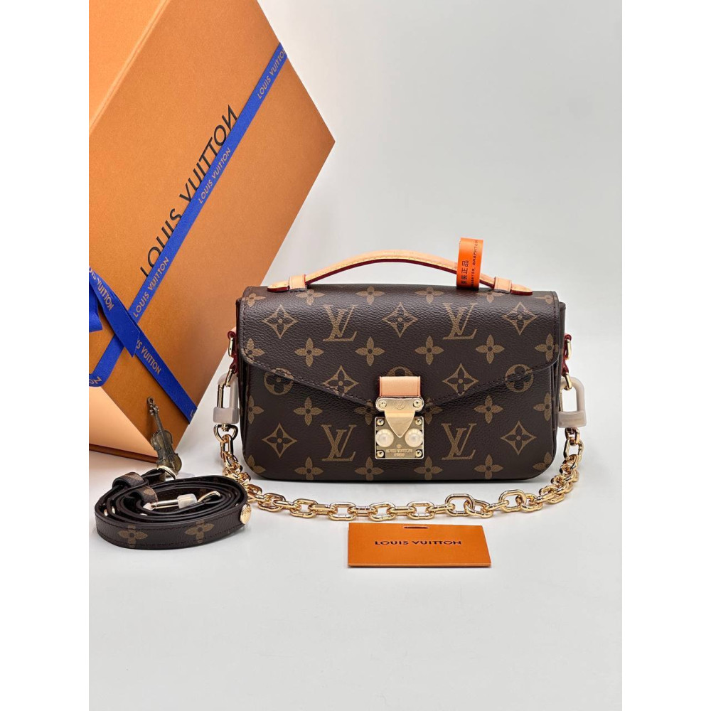 Pochette Métis East West Monogram Coated Canvas